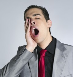test Businessman yawn boring on gray background