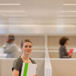 test Woman Standing over Cubes in an Office