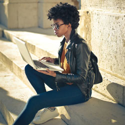 a women studying outside