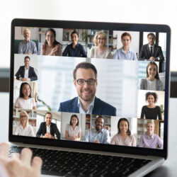 Employee talk on webcam conference with diverse colleagues